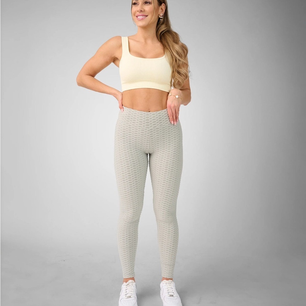 Elegant Cream Textured Leggings